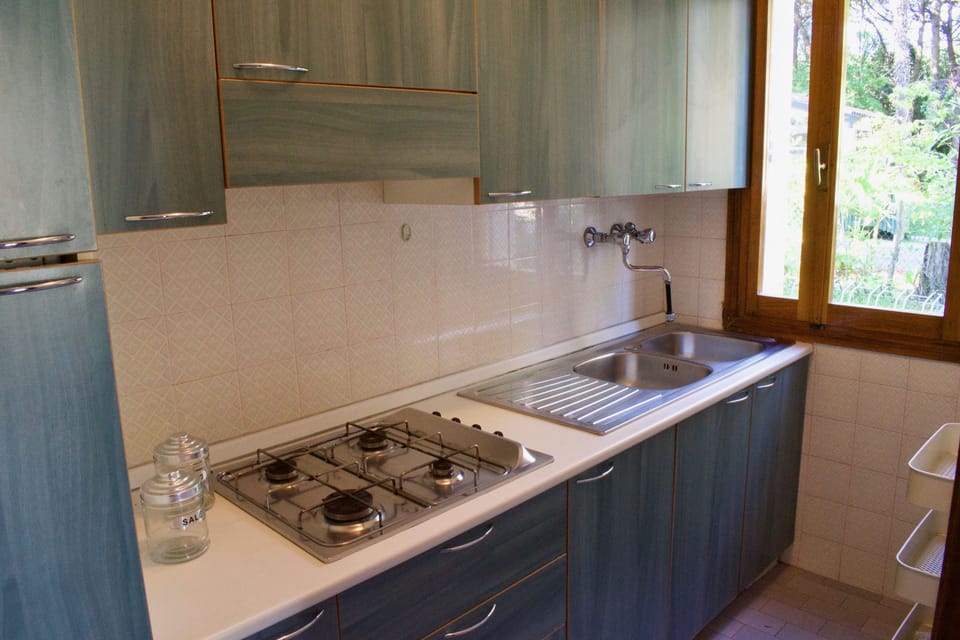 Family Apartment, 2 Bedrooms, Courtyard View, Ground Floor | Private kitchen | Full-size fridge, microwave, oven, stovetop