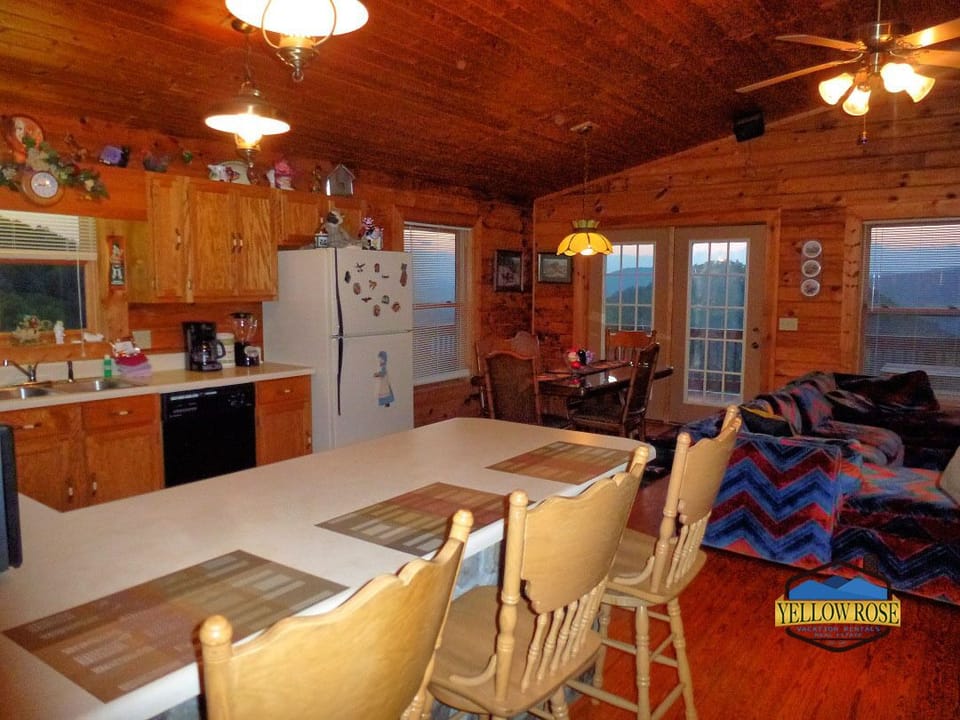 Kitchen - Kitchen area with dining room table and bar with seating