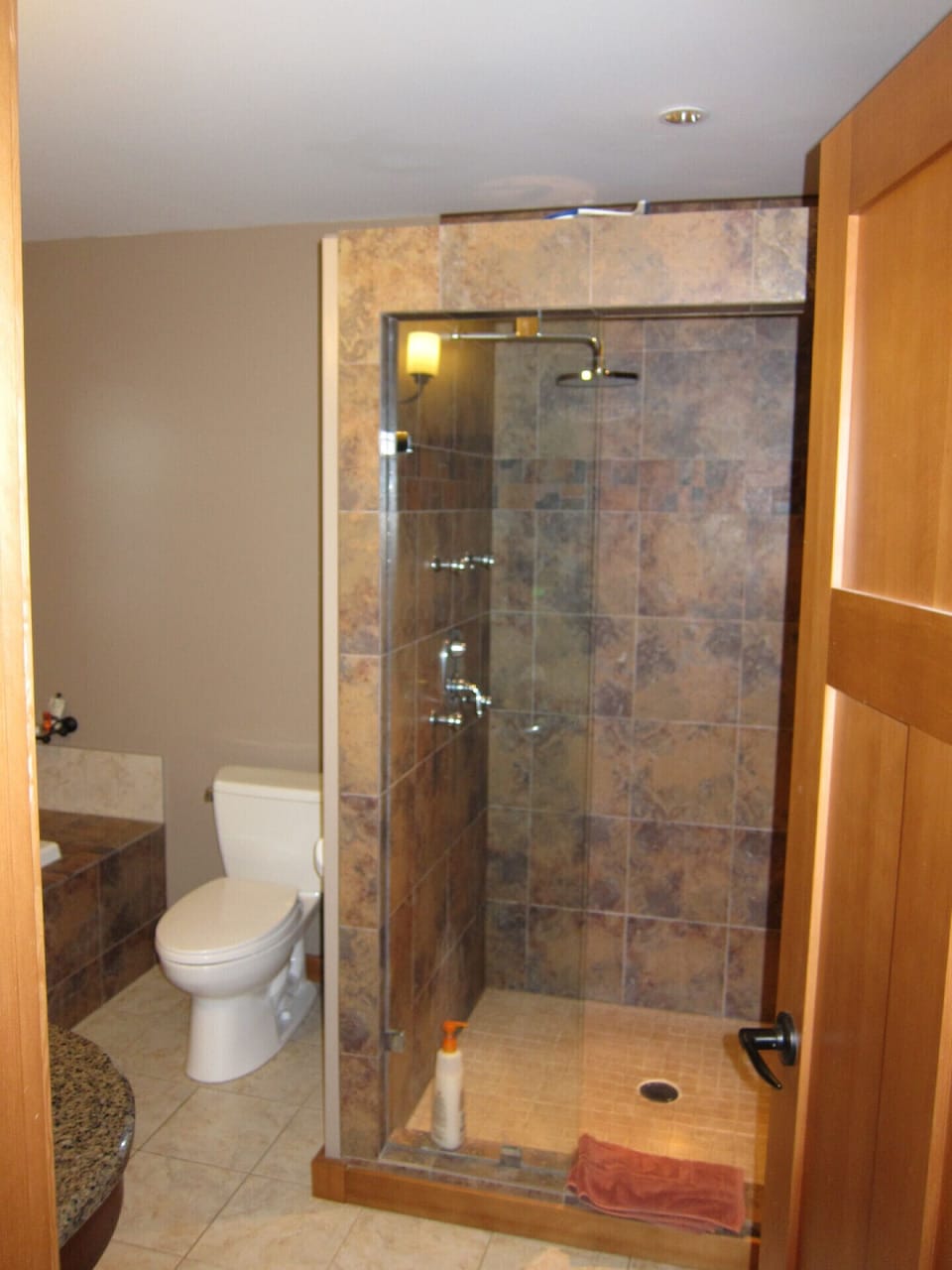 Master Bath walk in shower with rain head.