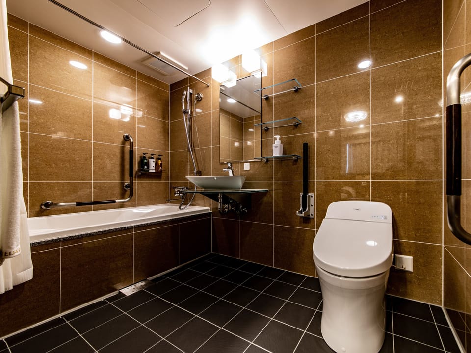 Deluxe Twin Room, Non Smoking | Down comforters, desk, laptop workspace, blackout drapes