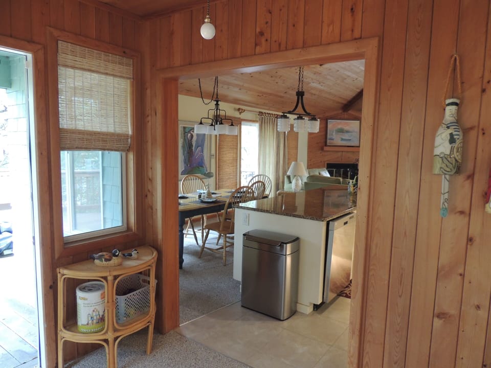 Just off the kitchen is a cozy sunporch