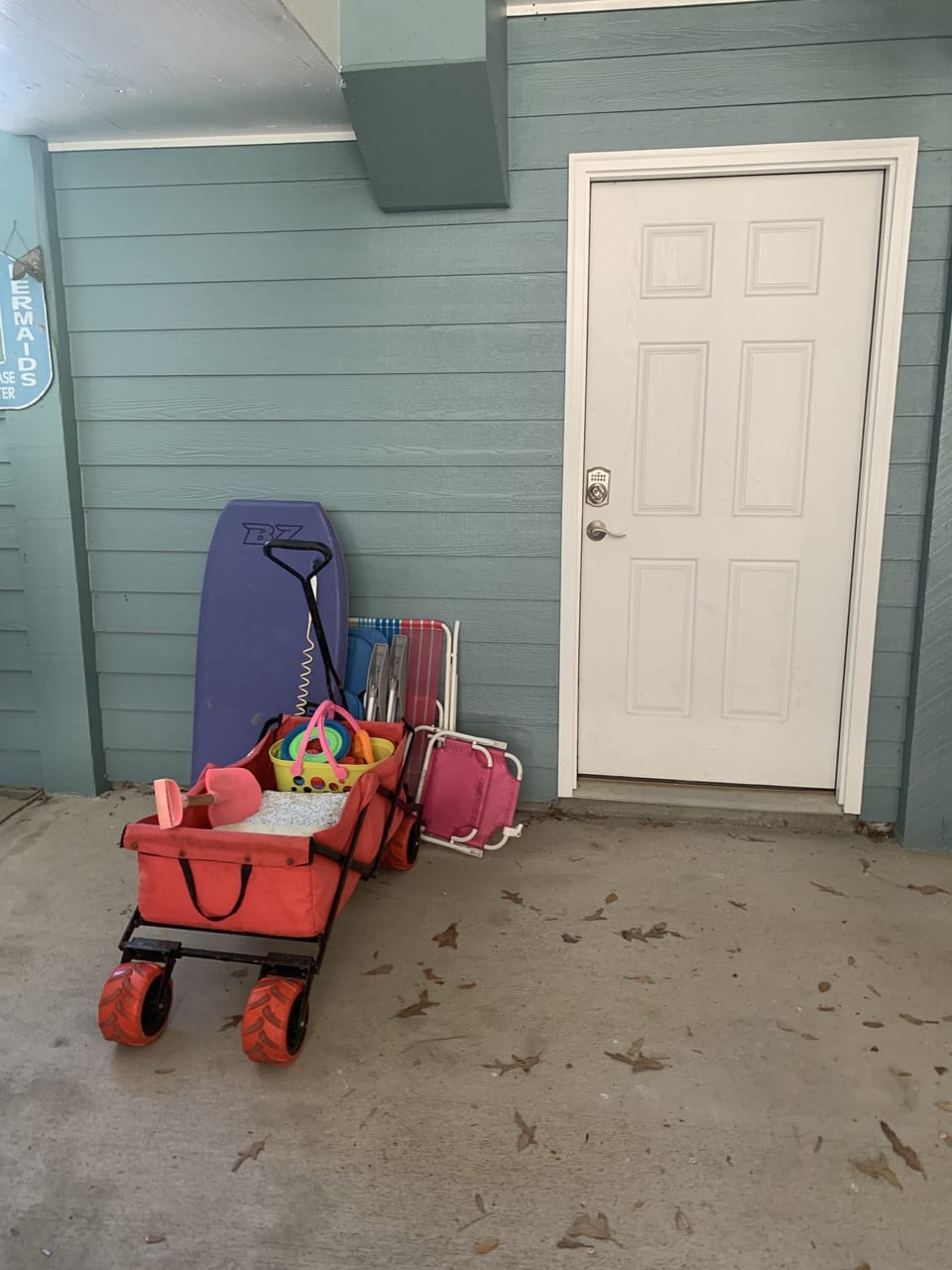 beach toys available along with bikes, swing, and ping pong