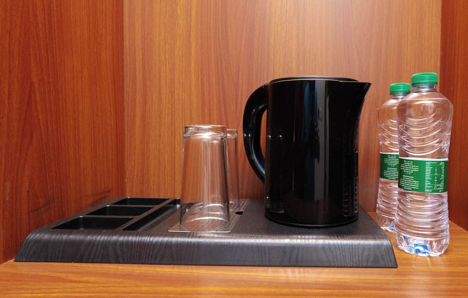 Deluxe Double Room | Desk, blackout drapes, iron/ironing board, free WiFi