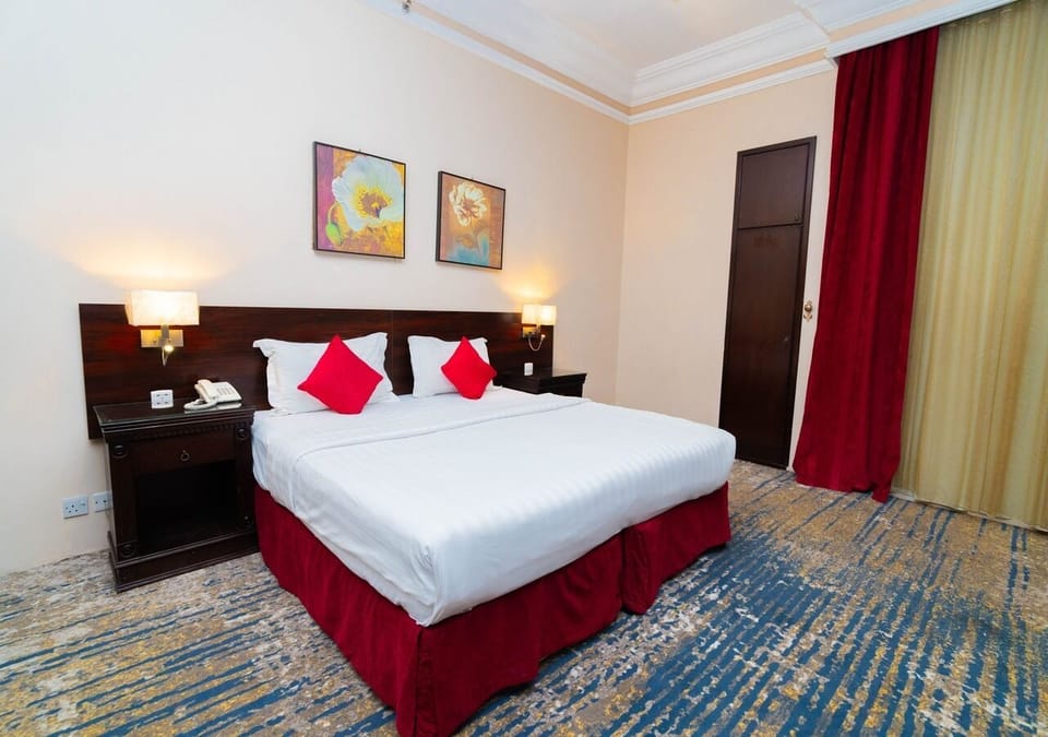 Double Room | Desk, blackout drapes, iron/ironing board, free WiFi
