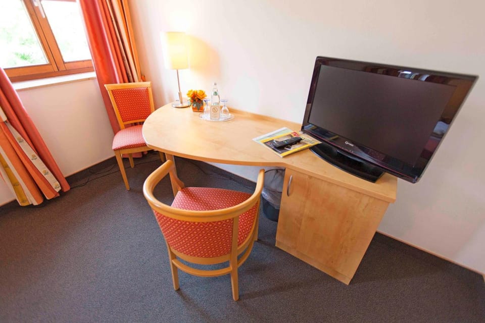 Desk, laptop workspace, blackout drapes, iron/ironing board (on request)