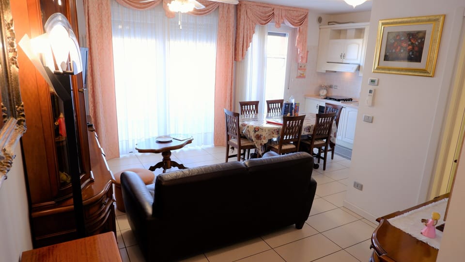 Family Apartment, Multiple Beds, City View, Tower | Living room | Flat-screen TV, DVD player