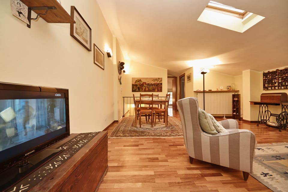 Apartment, 3 Bedrooms | Living room | Flat-screen TV, fireplace