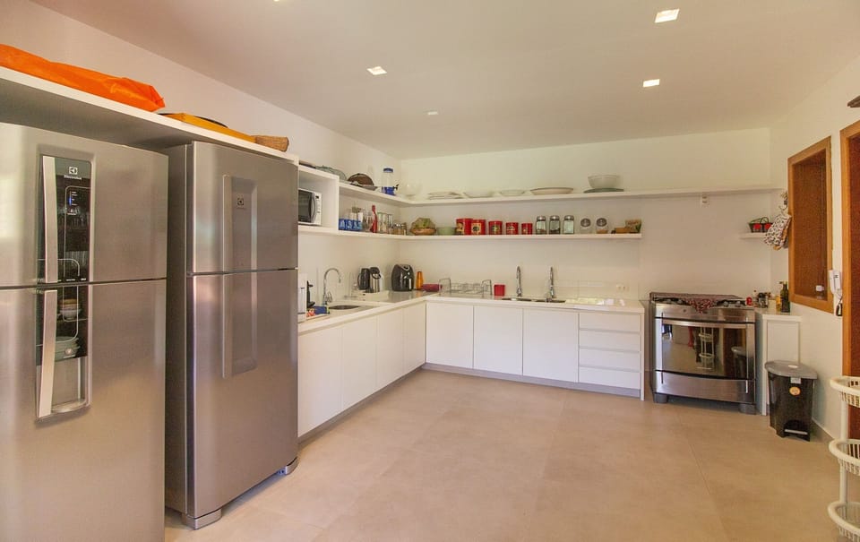 Villa | Private kitchen | Full-size fridge, microwave, oven, stovetop