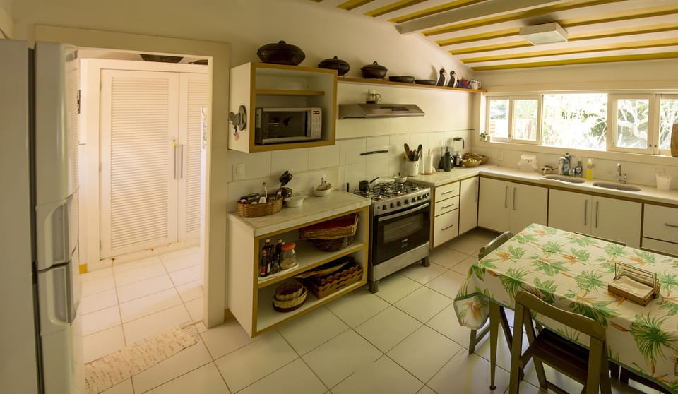 Villa | Private kitchen | Fridge, microwave, oven, stovetop