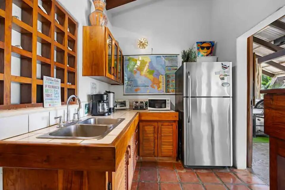 Full-size fridge, microwave, stovetop, toaster