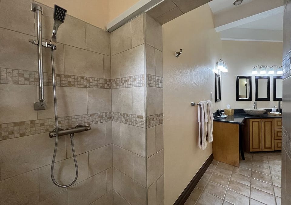 Seafoam bath. Oversized walk-in custom tile shower w/ 2 shower heads(1 pictured)