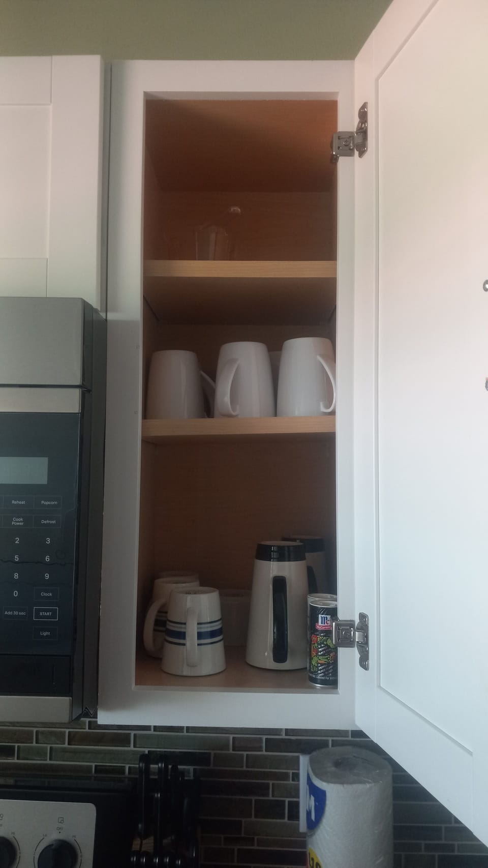 Kitchen cabinet with coffee cups