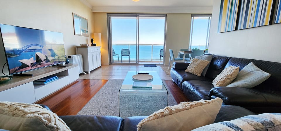 Living room with Smart TV and ocean views