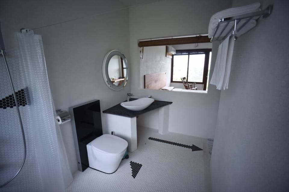 Double Room | Bathroom | Shower, hair dryer, slippers, towels