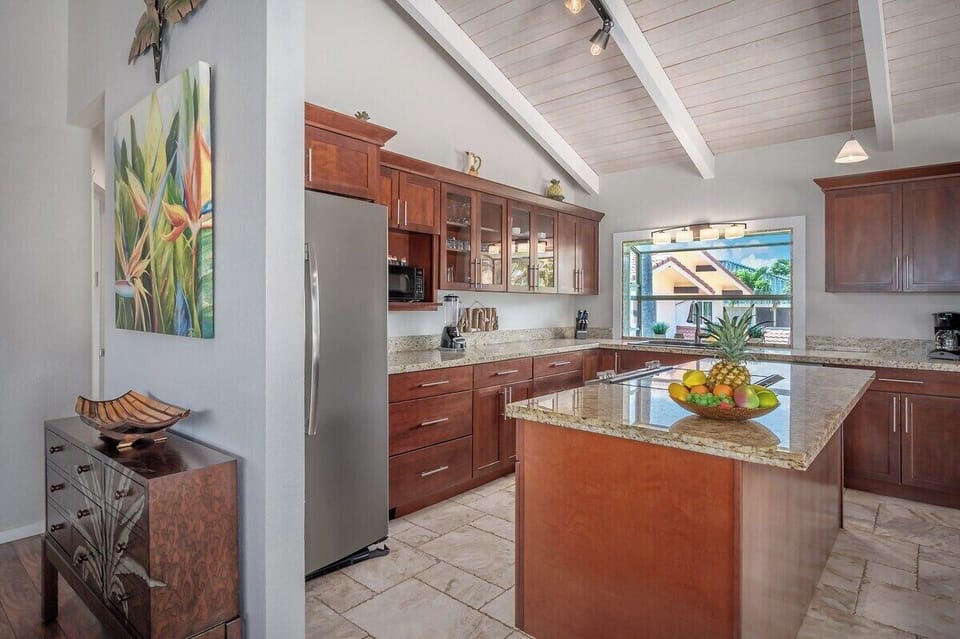 Hale Pono Remodeled Kitchen with Granite Countertops and Stainless Steel Appliances