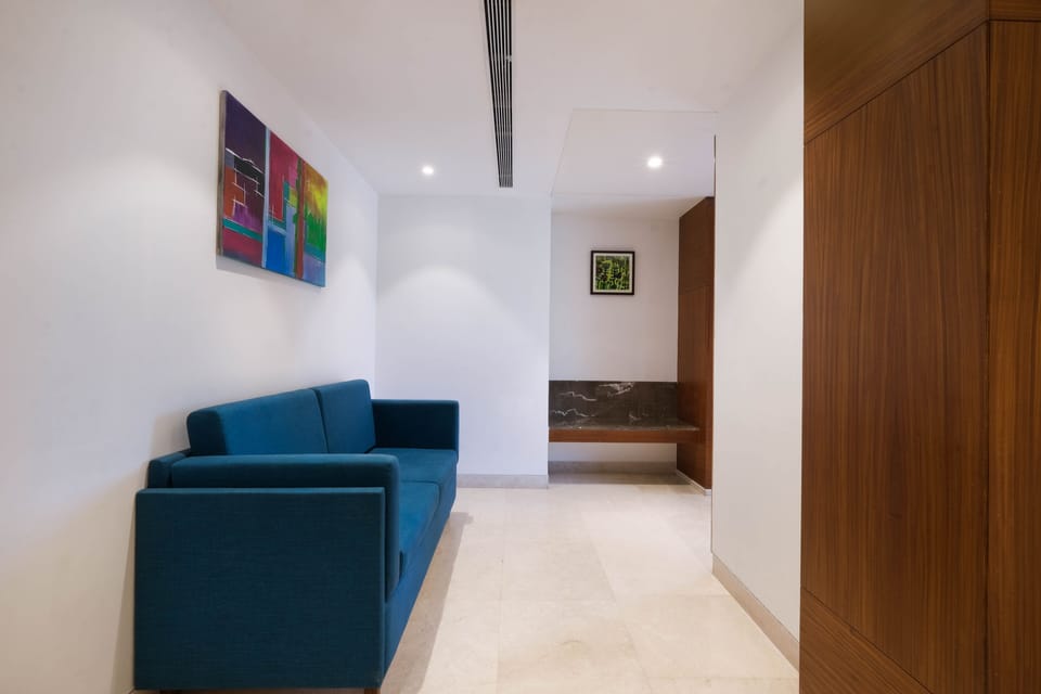 Suite, 1 King Bed, Non Smoking, City View | Living area | 32-inch LED TV with satellite channels, TV
