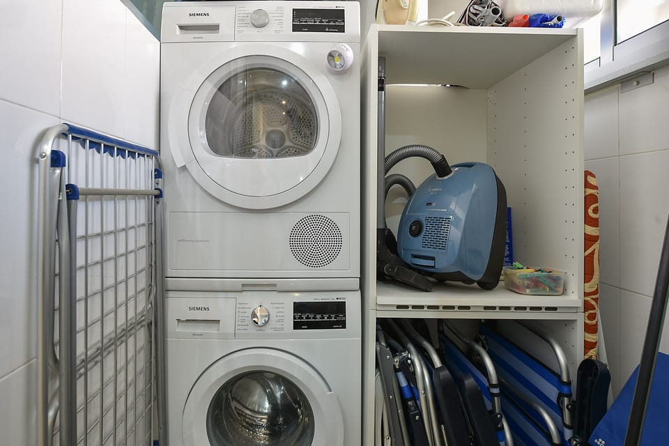 Laundry room with washing machine