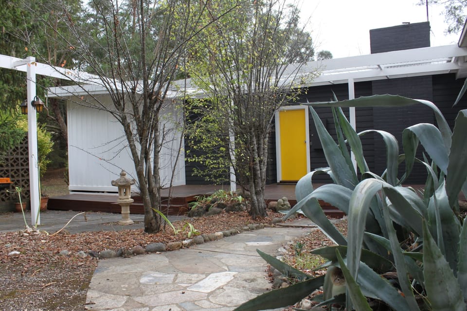 Front Entrance - featuring Sunny Corner's iconic yellow door