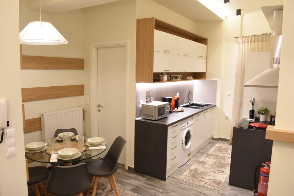 Deluxe Apartment (Lotus) | Living area | Flat-screen TV