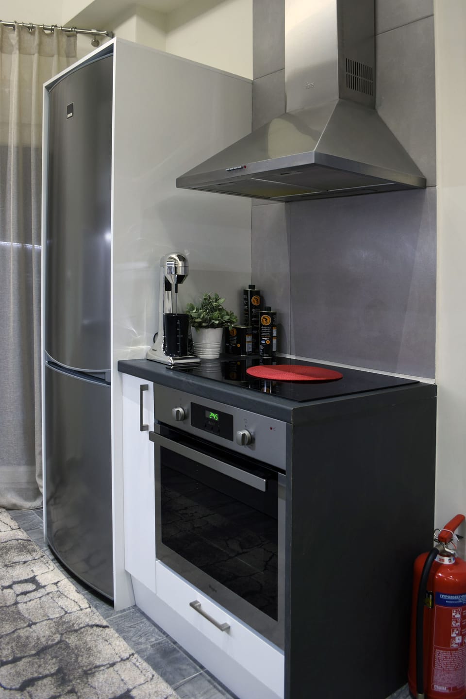 Deluxe Apartment (Lotus) | Private kitchen | Full-size fridge, microwave, stovetop, coffee/tea maker