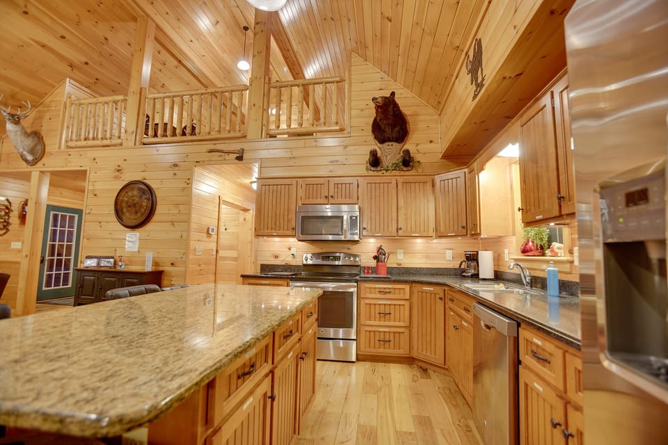 This fully-stocked kitchen is the oasis for all of our foodies. And with the open floor plan, you never have to miss a beat with the rest of the family while you are preparing your next tasty dish!