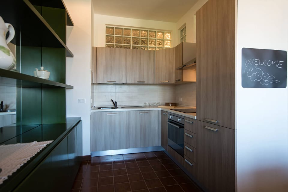 Villa, 4 Bedrooms | Private kitchen | Full-size fridge, microwave, oven, stovetop