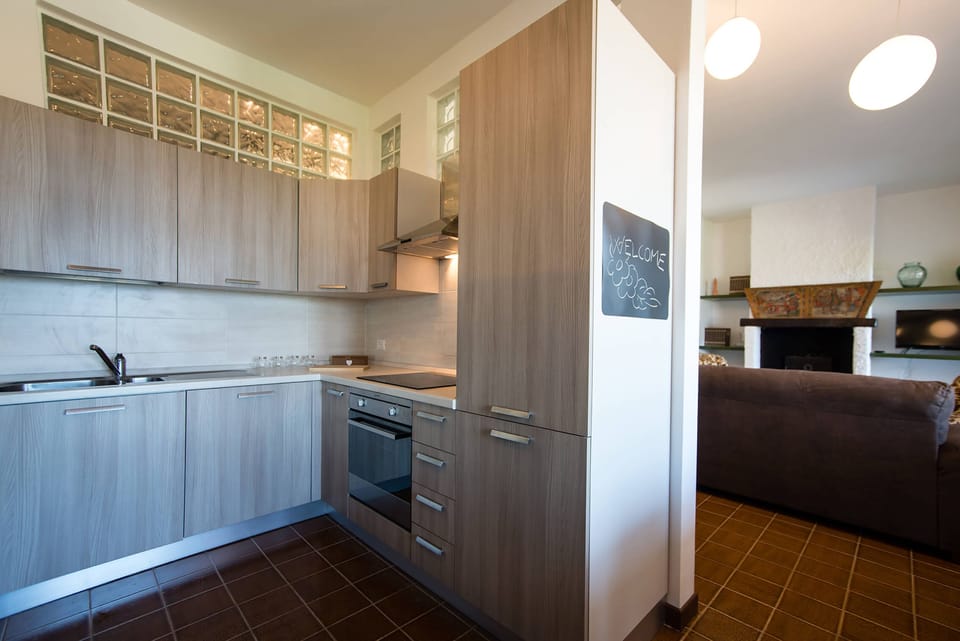 Villa, 4 Bedrooms | Private kitchen | Full-size fridge, microwave, oven, stovetop
