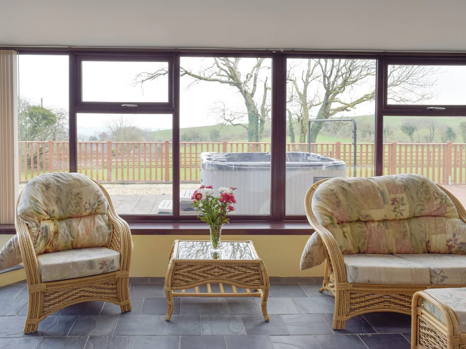 Light and airy sunroom | Brynhowell - Brynhowell Barns, Glandwr, near Narbeth