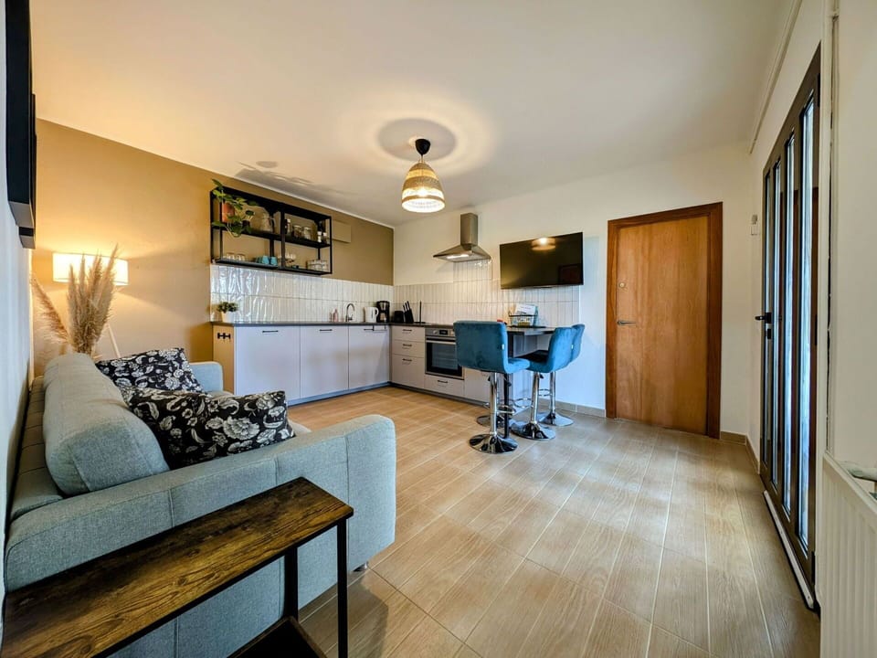 Furniture, Interior Design, Flooring, Floor, Couch, Ceiling, Wood, Room, Living Room, Lighting