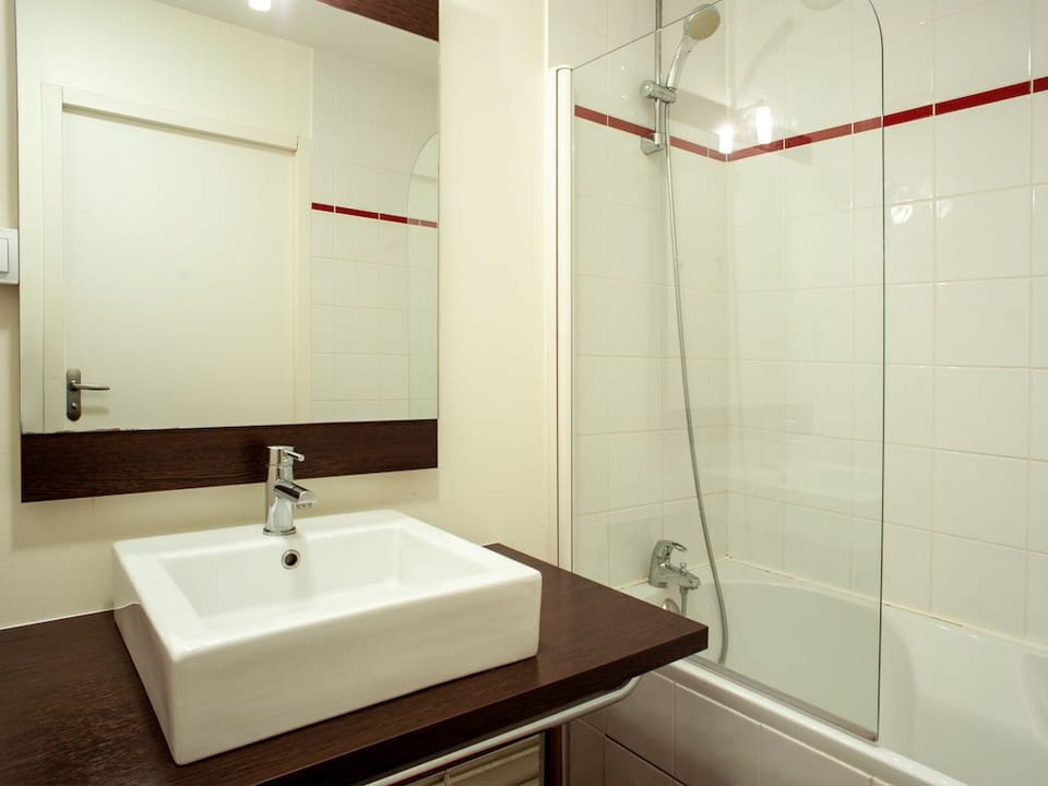 Freshen up in the bathroom after a day of adventure.