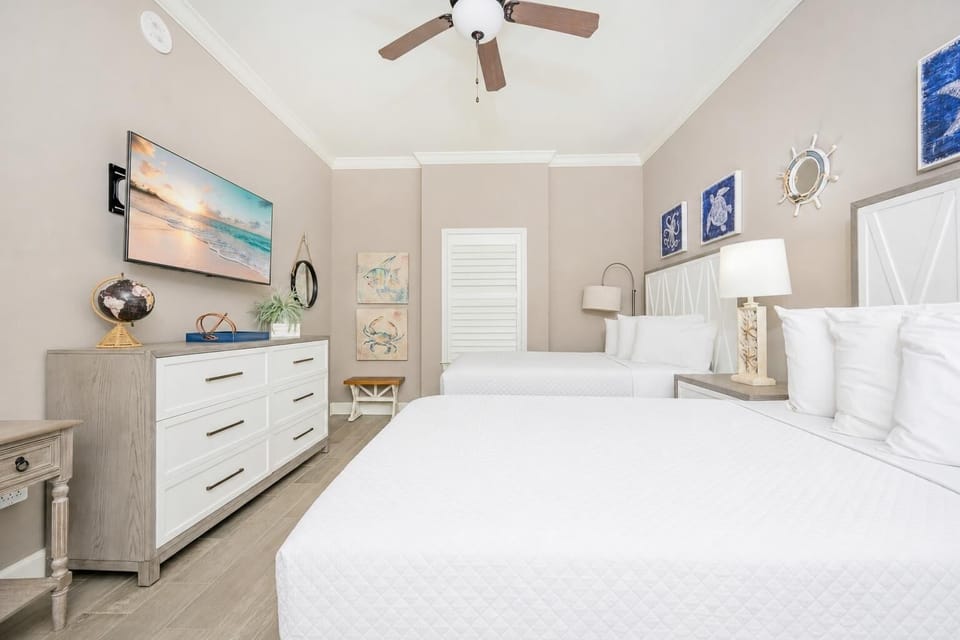 Unwind in this queen guest suite and stream your favorite shows or enjoy a good movie after a beach day