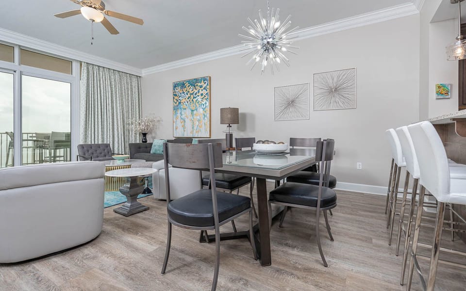 Gather in the chic dining area, savoring moments with loved ones amid stylish decor and soft lighting