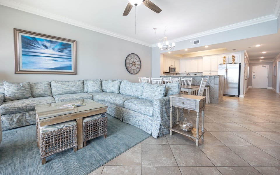 Unwind on the spacious couch, the perfect spot to enjoy laughter and stories with loved ones in this inviting space