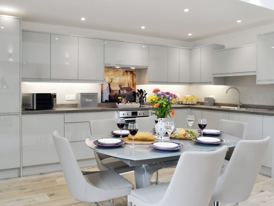 Convenient dining area and fully appointed kitchen | Ramerish Retreat, Laurieston, near Gatehouse of Fleet