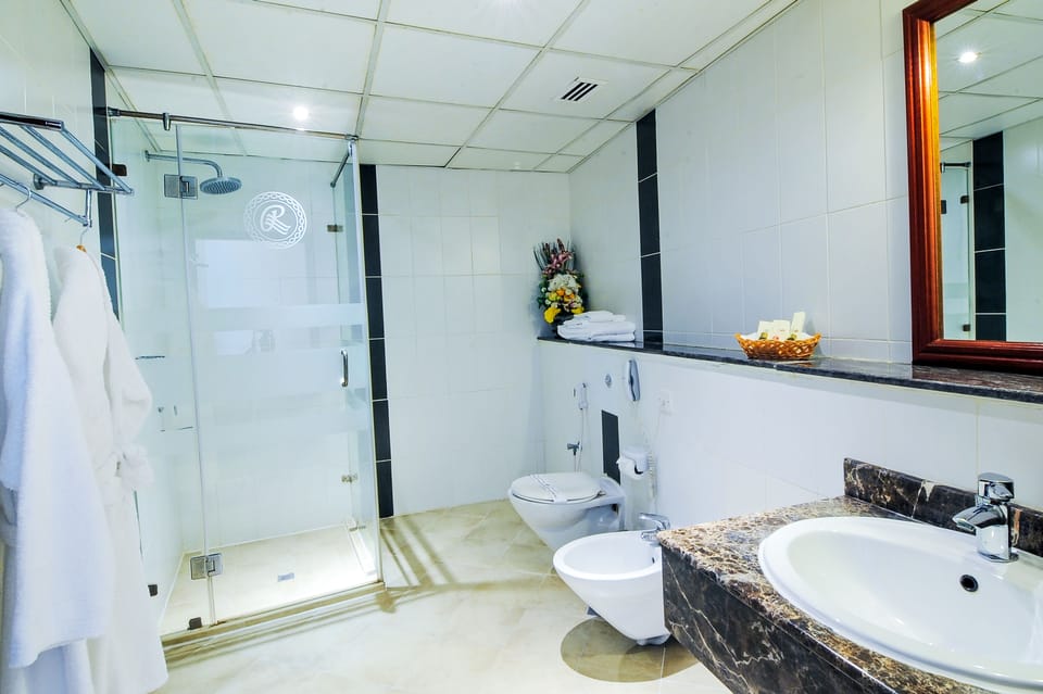 Shower, free toiletries, hair dryer, bathrobes