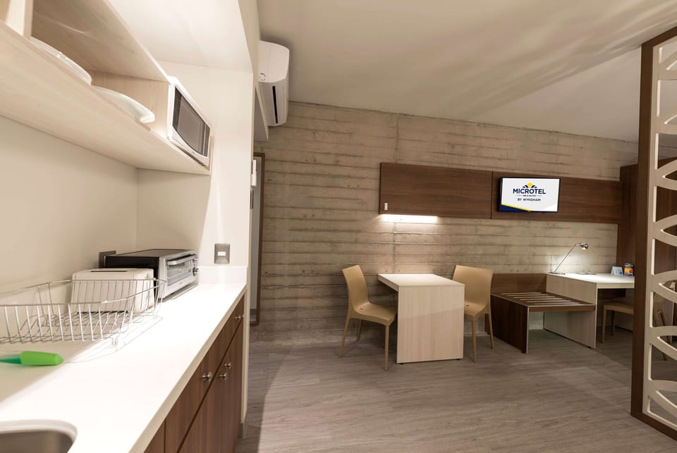 Suite, 1 King Bed, Non Smoking | Premium bedding, Tempur-Pedic beds, in-room safe, desk