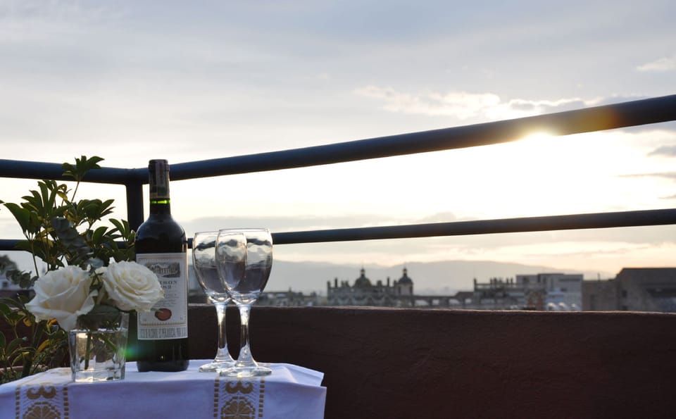 Stunning city views from our rooftop for unforgettable sunrises and sunsets