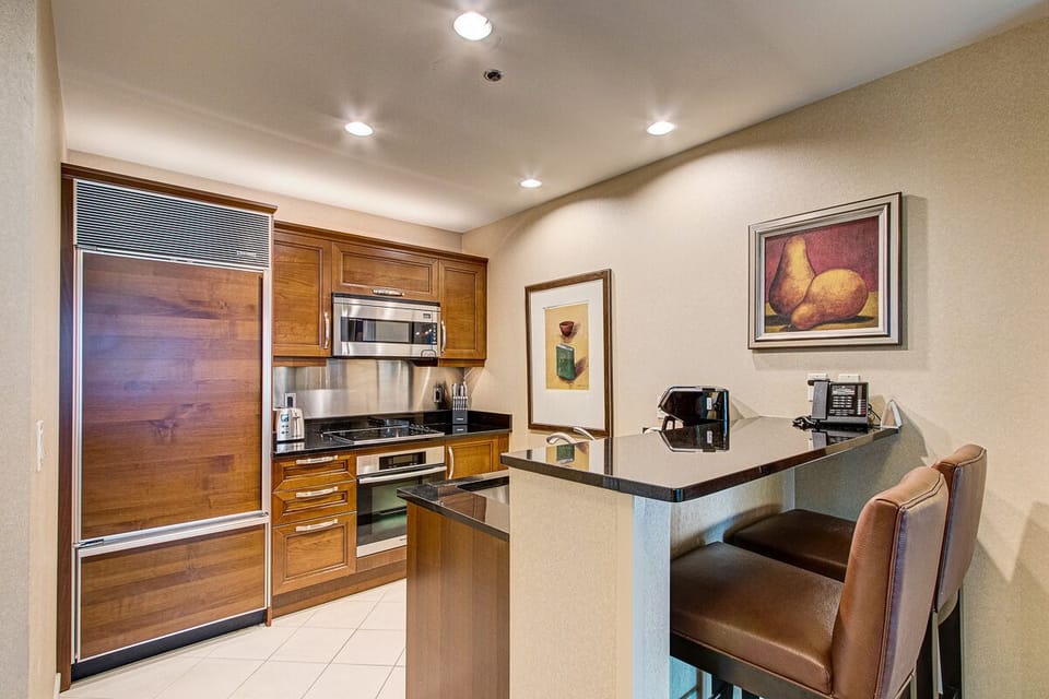 Kitchen features Subzero, Small Miele oven and Bosch ..blender and toaster.