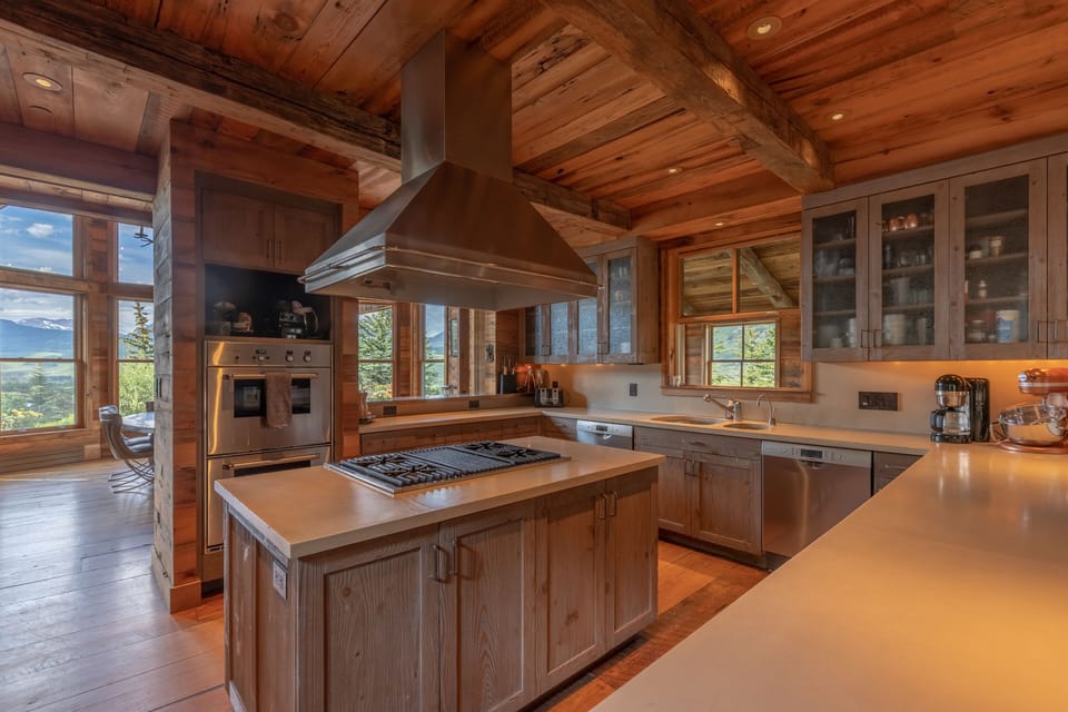 the kitchen has double dishwashers, double oven, drip coffee, Keurig, mixer...