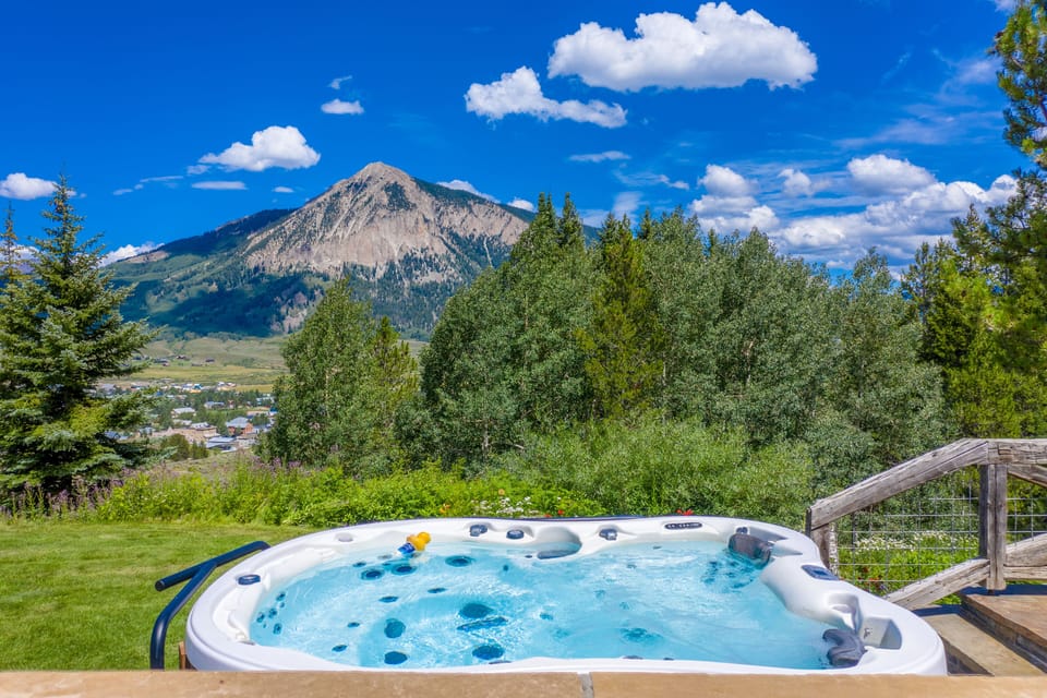 large salt water hot tub sits 8