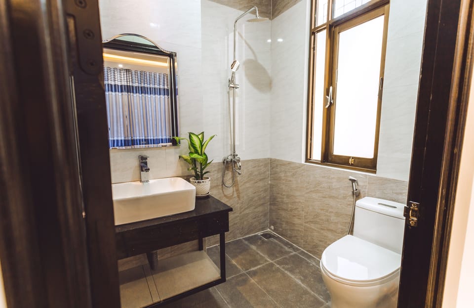Shower, free toiletries, hair dryer, bathrobes