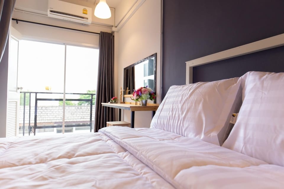 Standard Triple Room | Desk, blackout drapes, soundproofing, free WiFi