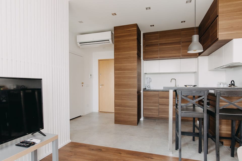 Exclusive Apartment, City View | Private kitchen | Full-size fridge, oven, stovetop, dishwasher