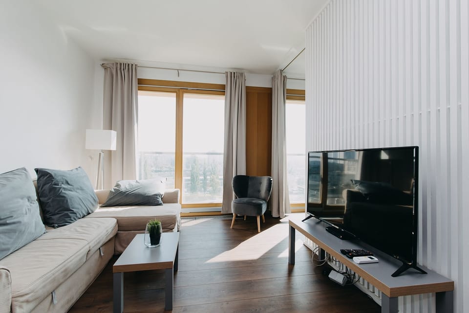 Exclusive Apartment, City View | Premium bedding, laptop workspace, blackout drapes, iron/ironing board