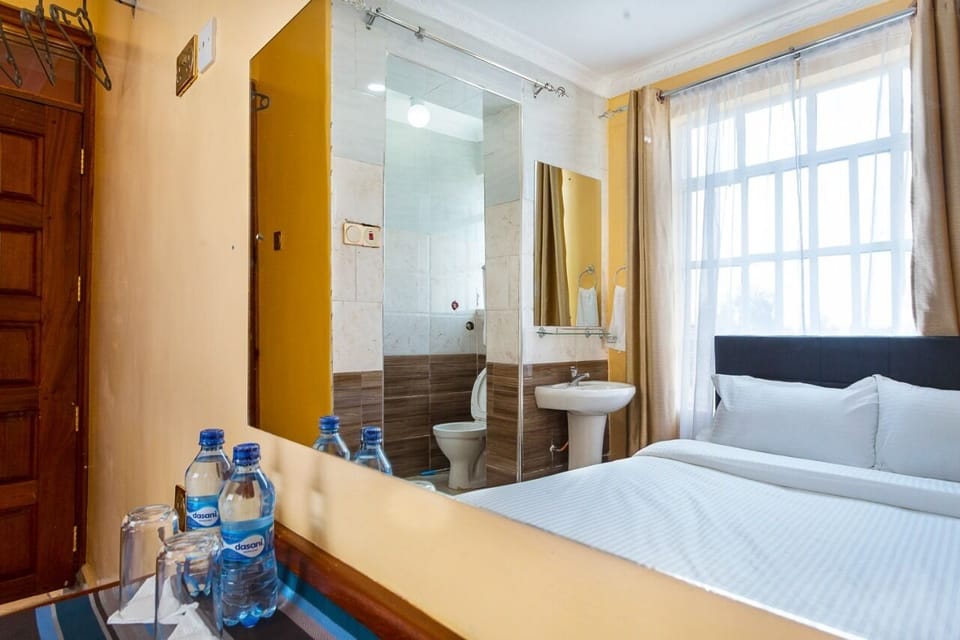 Premium bedding, memory foam beds, desk, laptop workspace