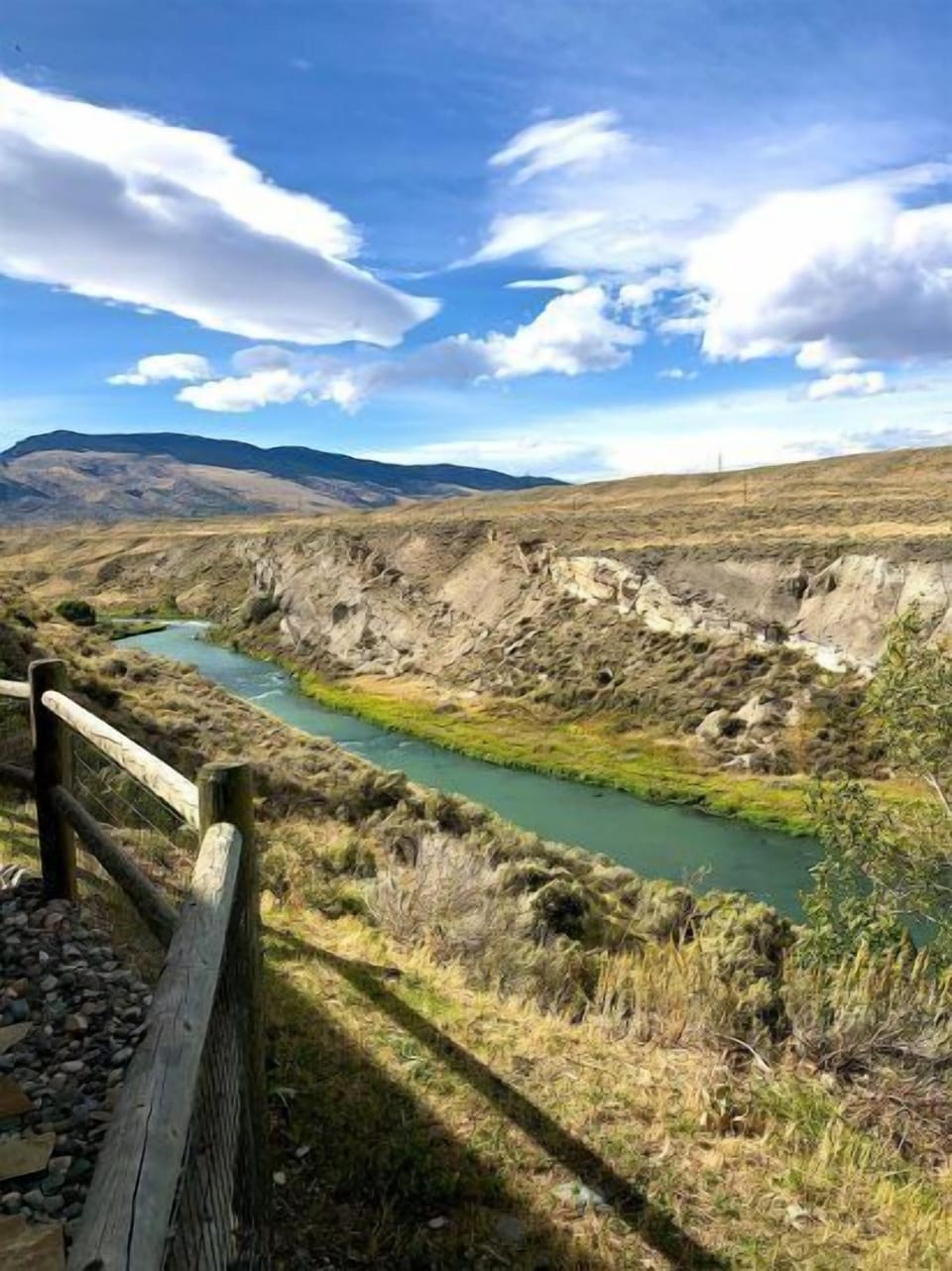 The Shoshone River beckons anglers while Rattlesnake Mountain rises in the background