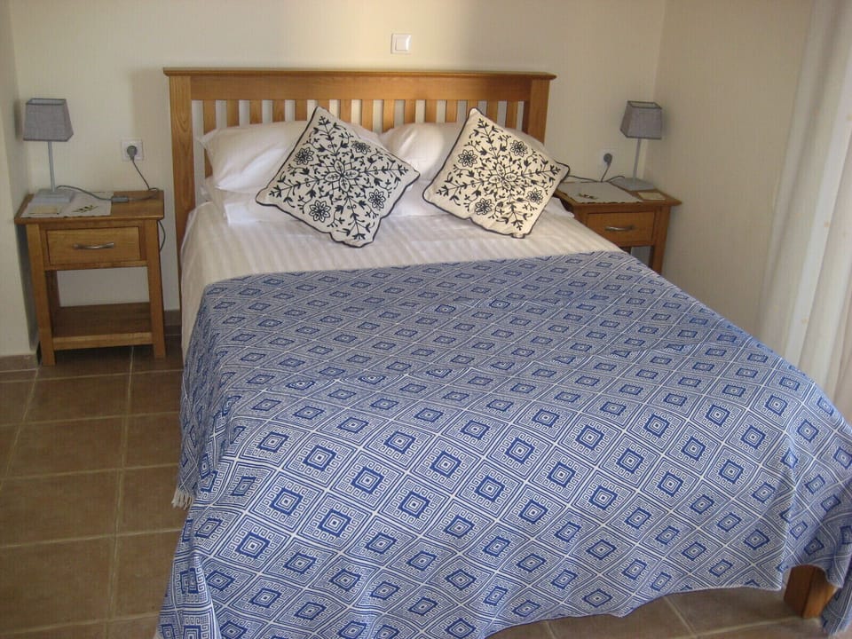 Main Bedroom - with air conditioning and ceiling fan