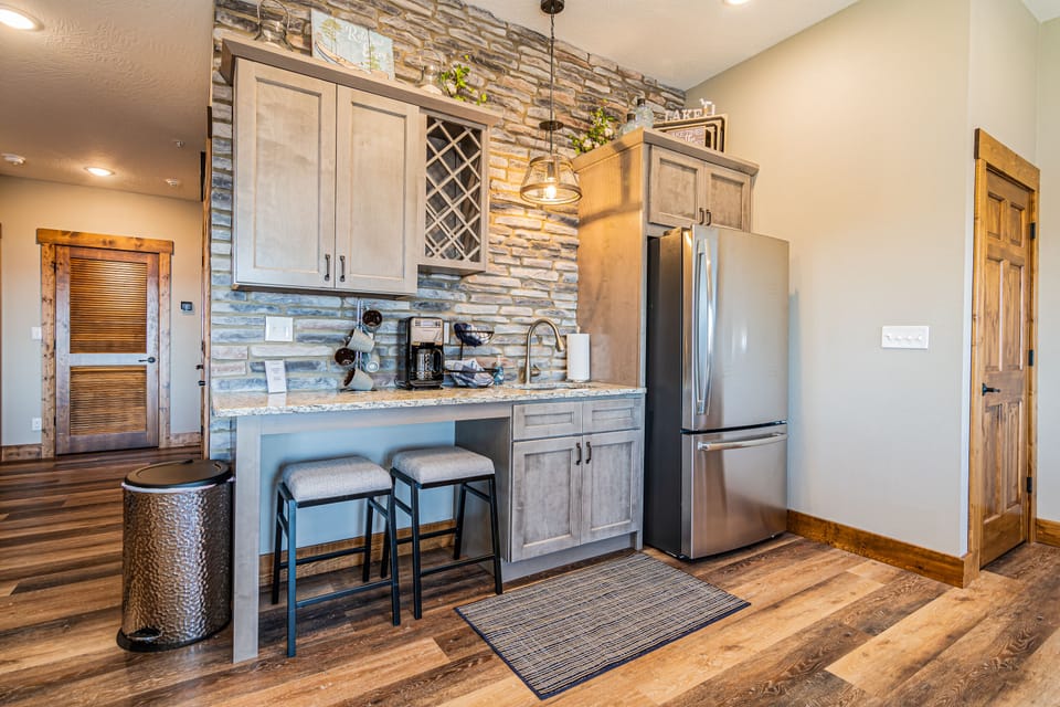Lower level kitchen with a second fridge!