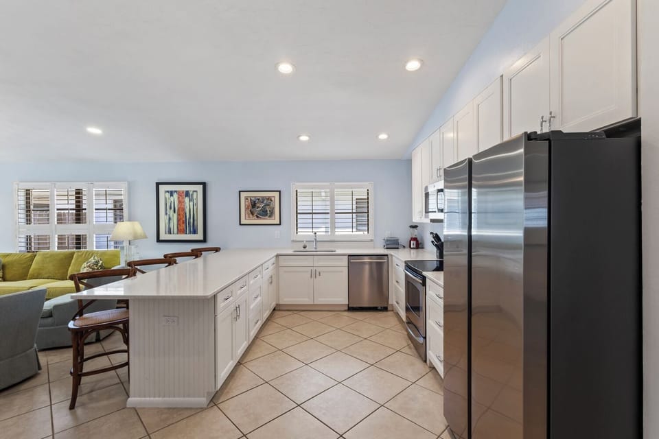 House, Multiple Beds | Private kitchen | Full-size fridge, microwave, oven, stovetop
