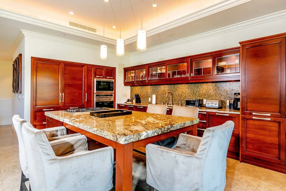 Luxury Contemporary Island Style Kitchen with Cozy Sitting Area